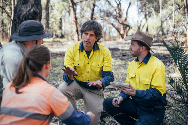 Summarising the Data Collected Rockingham Lake regional park.Team of scientific environmental conservationist working together collecting data. The Australian Bush has been damaged by fire. wildlife conservation stock pictures, royalty-free photos & images