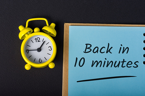 Back in 10 minutes notice on business workplace.
