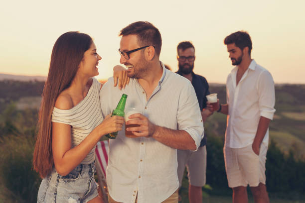istock Couple making a toast at a party 1199904641