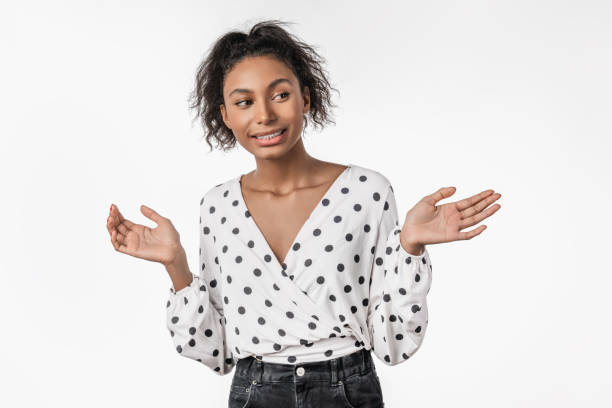 istock African female feeling guilty confused making helpless gesture with hands 1199906292
