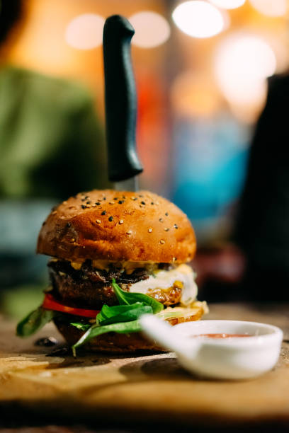 istock Close-Up Of Burger In Plate On Table 1199906640