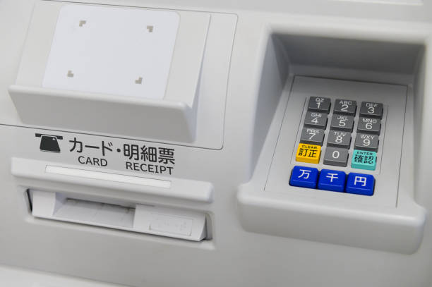 Close up of keyboard and insert card of Japanese ATM machine stock photo