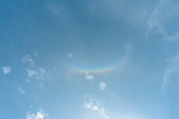 istock Low Angle View Of Halo Rainbow On Blue Sky 1199908139