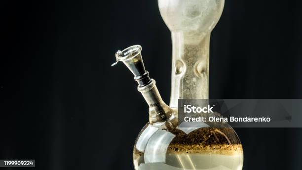 Closeup Of Dirty Water Bong On Black Background Smoking Cannabis With Water Pipe Stock Photo - Download Image Now