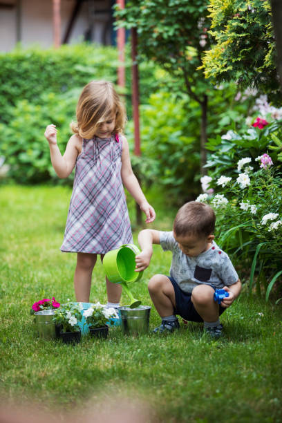 istock Little gardeners 1199913071