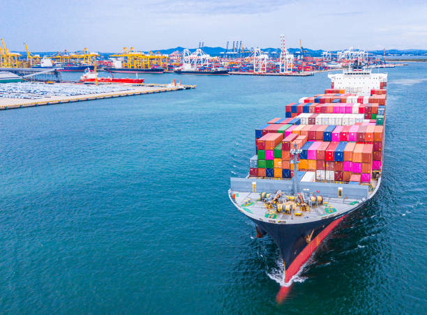 istock Container Ship Vessel Cargo Carrier. import export logistic and export products worldwide 1199920550