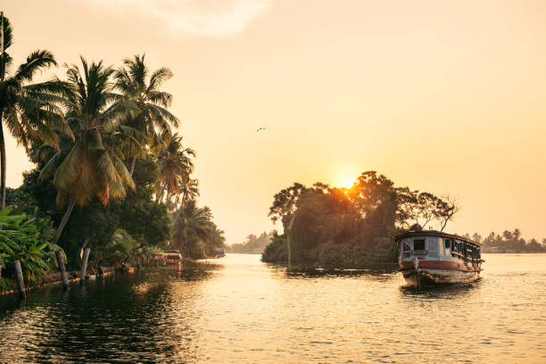 istock Alleppey backwaters with local boat on sunrise 1199921766