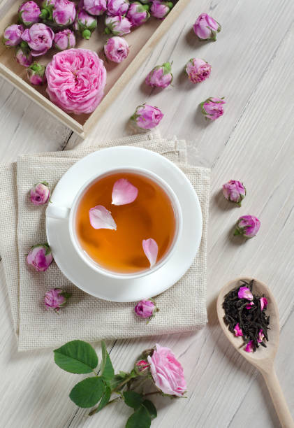 istock Cup of tea with   roses 1199922397