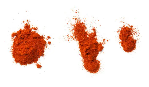 Photo of Cayenne Pepper Powder Isolated On White Background