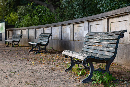 Rest benches in front of a park