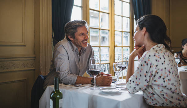 istock Lovely couple at a restaurant on Valentine's day 1199926537