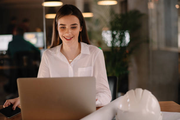 istock Business woman working on the computer in the office 1199930831