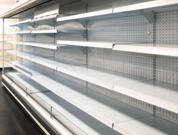 istock Empty supermarket refrigerator shelves 1199942692