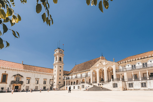 main square of historic university of Coimbra on hot summer day