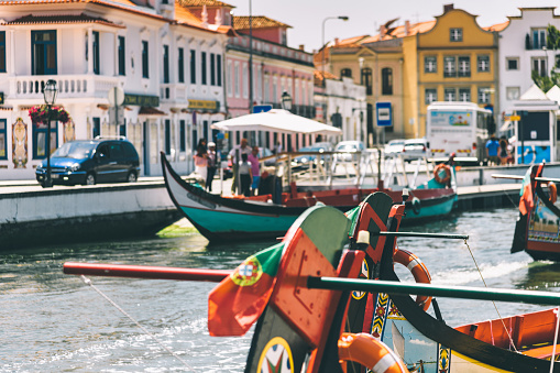 view  on the canal of Aveiro with colorful typical wooden boats