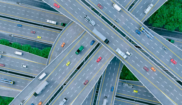 istock Cars and trucks during rush hour seen from high angle view 1199946586
