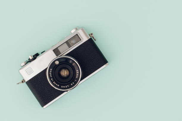 istock Retro style camera on color background. Top view, flat lay 1199951129
