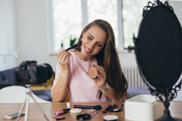 istock woman video blogger 1199951463