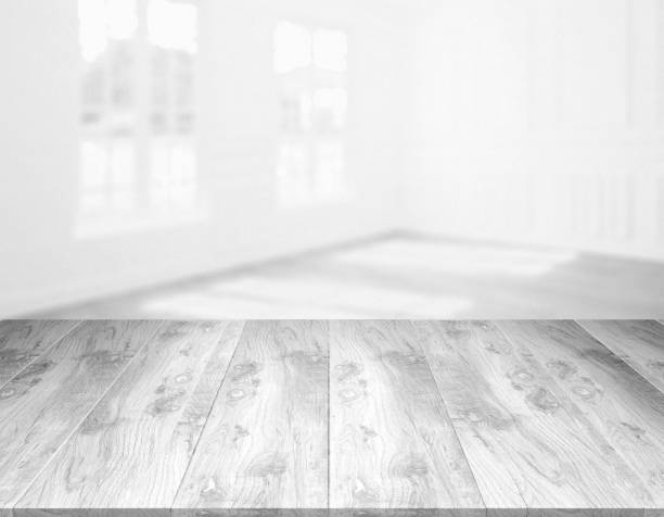 istock rustic blank wooden table top in front of blurry room 1199952798