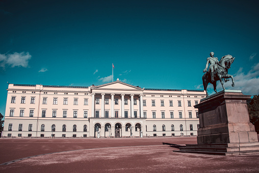 25th of September, 2015, A statue of Carl Johan and Oslo Royal Palace.