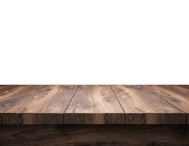 istock rustic blank wooden table top in front of blurry room 1199952908