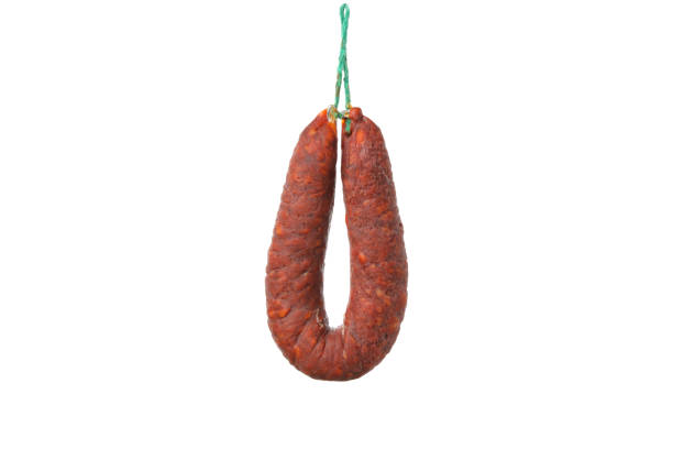 istock Delicious hanging sausage isolated on white background 1199953915