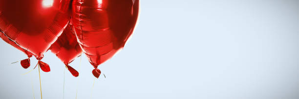 istock Composite image of red heart shape balloons 1199954217