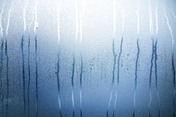 istock Glass with Condensate, Window with Steam and Water as Background or Texture 1199955177
