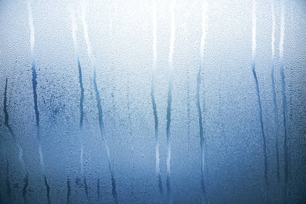 istock Glass with Condensate, Window with Steam and Water as Background or Texture 1199955182