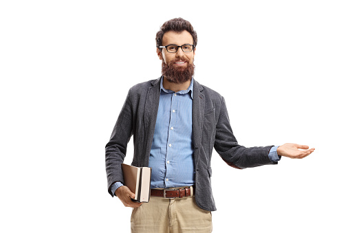 Bearded man holding books and making welcome gesture isolated on white background