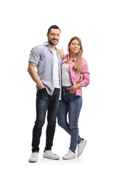 istock Young casual couple posing in embrace 1199956594