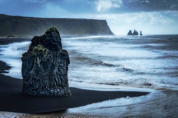 istock volcanic pinnacles on the black beach of Vik, Iceland 1199956933