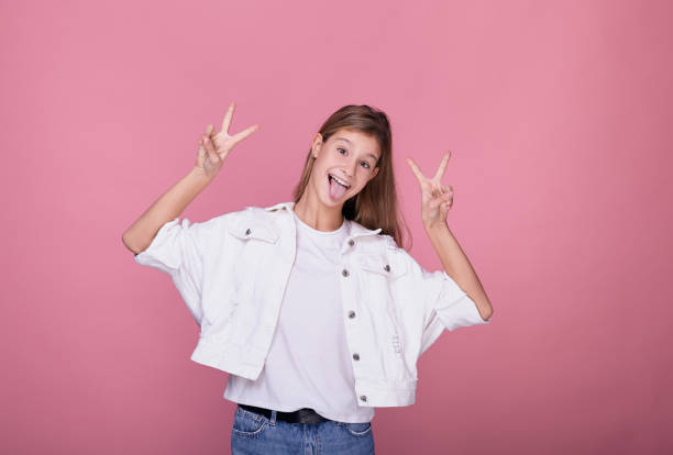 istock Girl shows language and peace sign with two hands. 1199957207