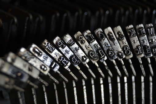 Letters and numbers in the typo of a old qwerty typewriter