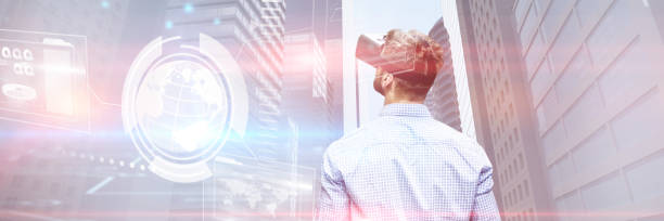 istock Composite image of man holding virtual reality glasses 1199958167