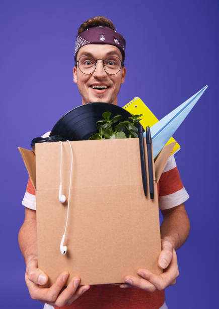 istock Having fun boy with a box in his hands. 1199963519