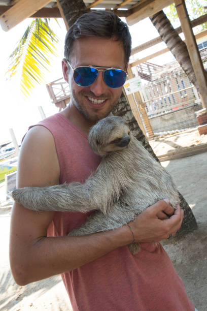 istock Hanging out with the sloth 1199964907