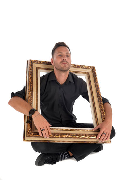 istock A man with the picture frame 1199966137