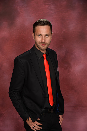 Red Tie On The Black Suit Stock Photo - Download Image Now - Adult, Adults  Only, Beautiful People - Istock