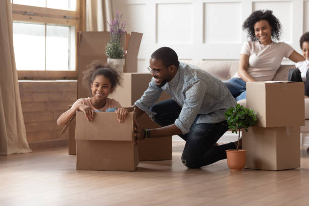 istock Happy black father playing with smiling daughter. 1199968683