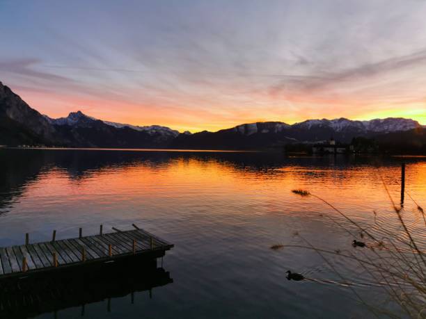 istock Sunset at a lake in the Alps 1199974461