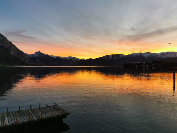 istock Sunset at a lake in the Alps 1199974536