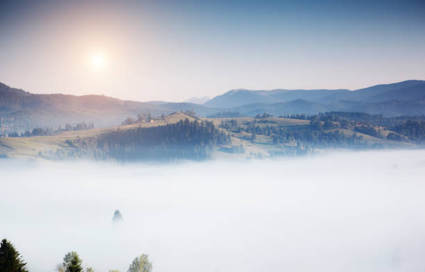 istock Great view of alpine village glowing by sunlight. 1199975533