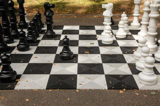 istock Large outdoor chess in autumn Park, daylight 1199981079