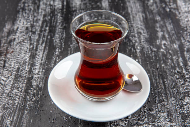 istock Turkish tea in a glass on a wooden table. 1199988610