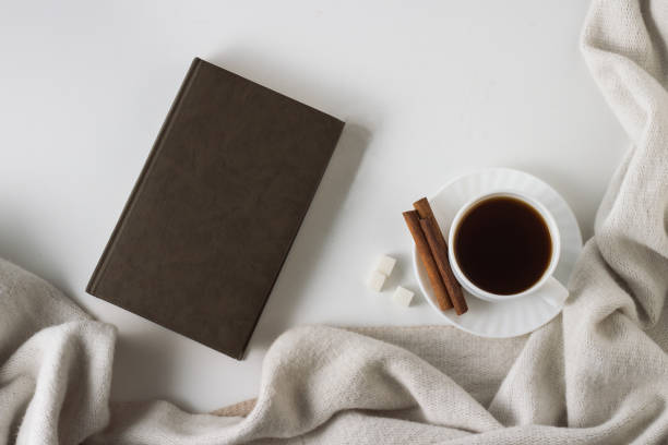 istock Cup with Coffee, Scarf, Book on the White Background. Flat lay, top view 1199988868