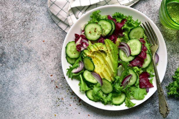 istock Fresh vegetable salad with avocado and cucumber 1199988908