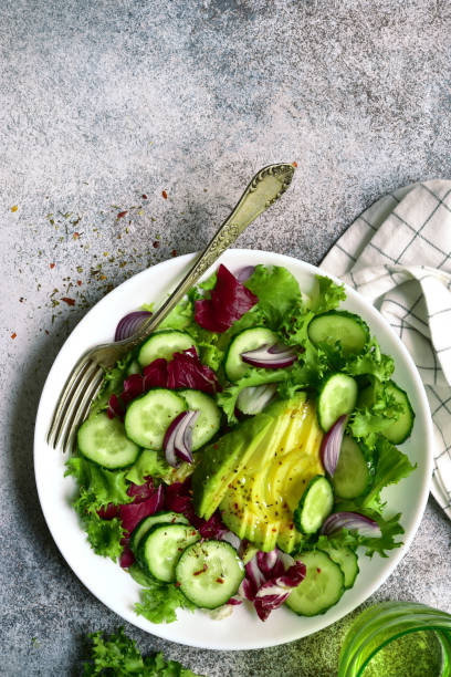 istock Fresh vegetable salad with avocado and cucumber 1199988956