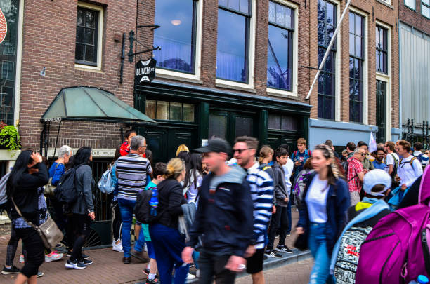 Amsterdam, Holland, August 2019. Anne Frank's house is a destination for many tourists: the crowd in the street is remarkable.