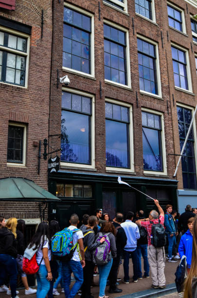 Amsterdam, Holland, August 2019. Anne Frank's house is a destination for many tourists: the crowd in the street is remarkable.